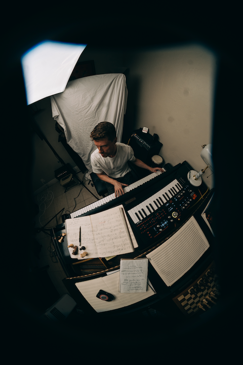 Portrait of Luke Benedict at the piano